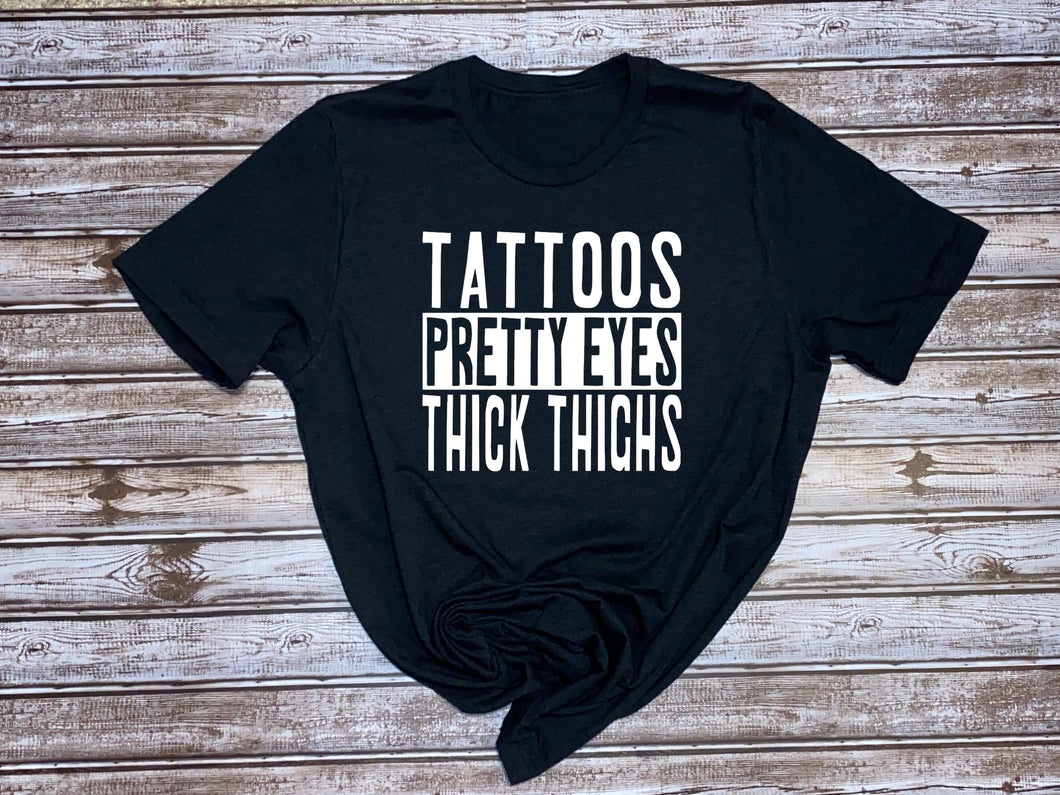 Tattoos, Pretty Eyes, Thick Thighs ~  Ladies T-shirt